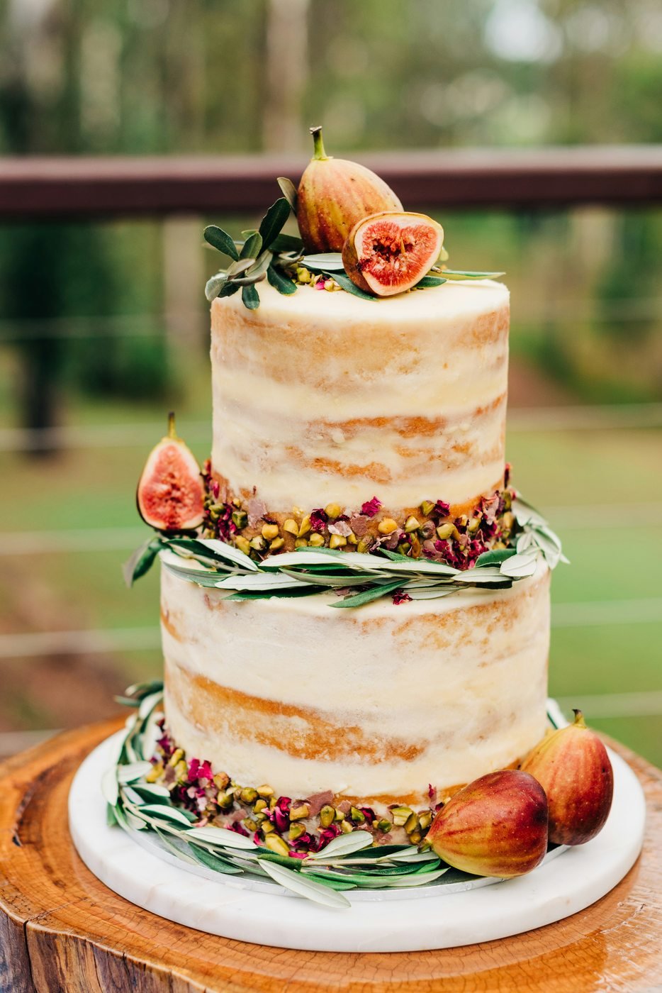 Three-tier cake with figs