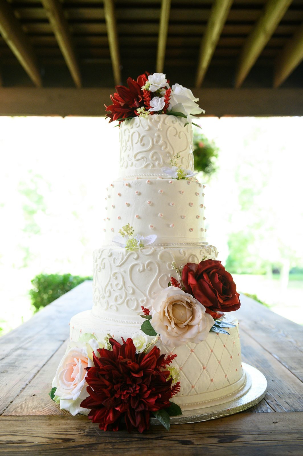 Four-tier white wedding cake